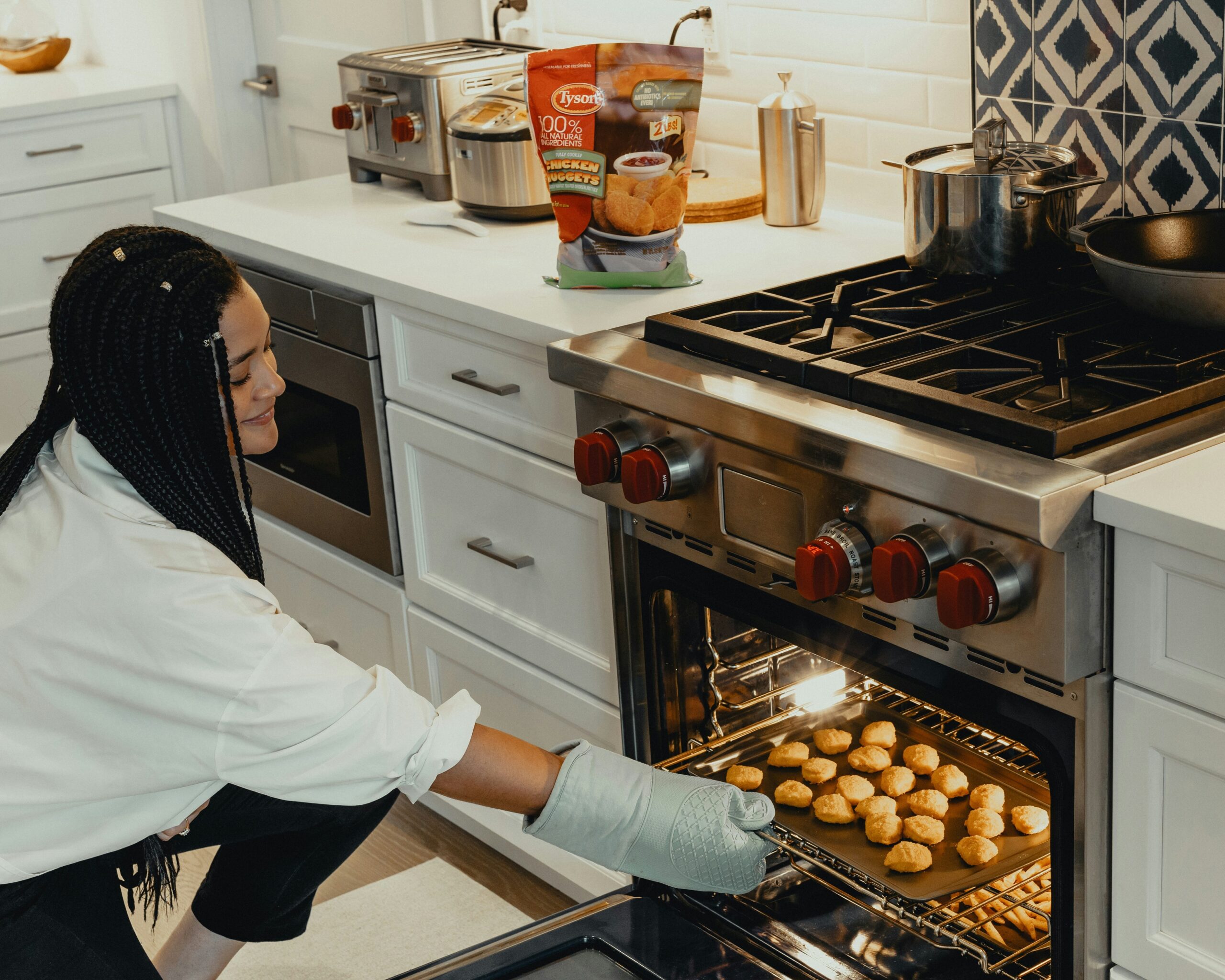 Photo of Sarah preparing meals in her kitchen