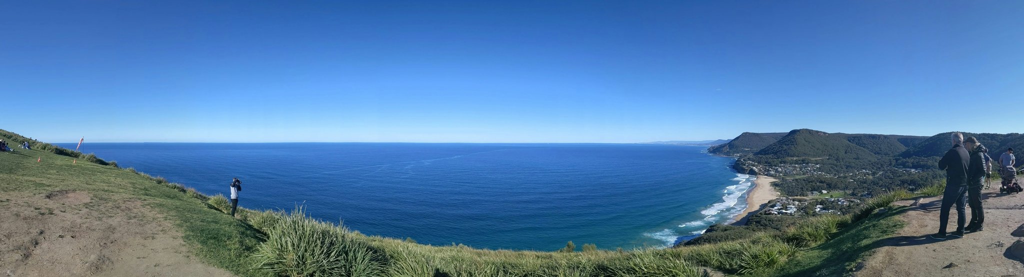 A woman looking stressed while holding a basket of groceries