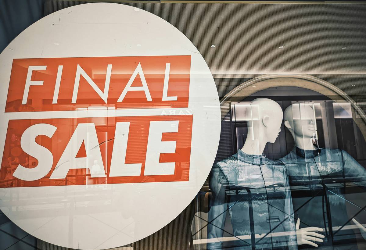 Smartphone displaying loyalty app with available discount offers