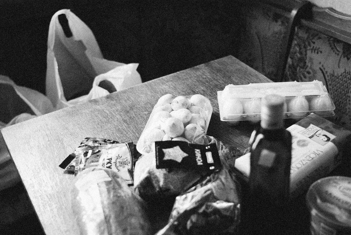 Receipt showing $29.74 total for high-protein groceries at TOPS including markdown items and digital coupons