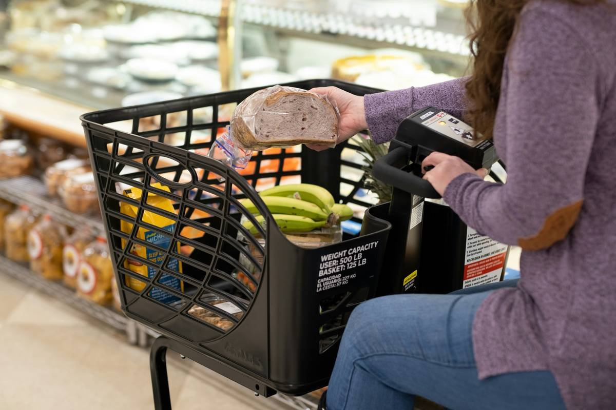 Grocery shopping with motorized shopping cart